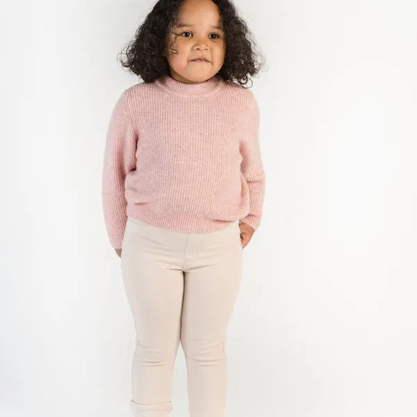 Girl in pink sweater